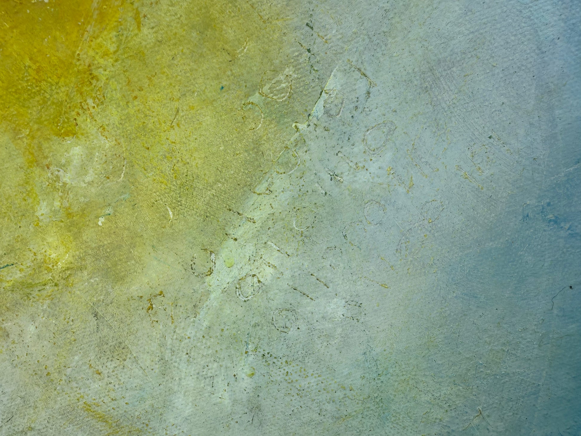 Textured surface with a gradient from yellow to blue